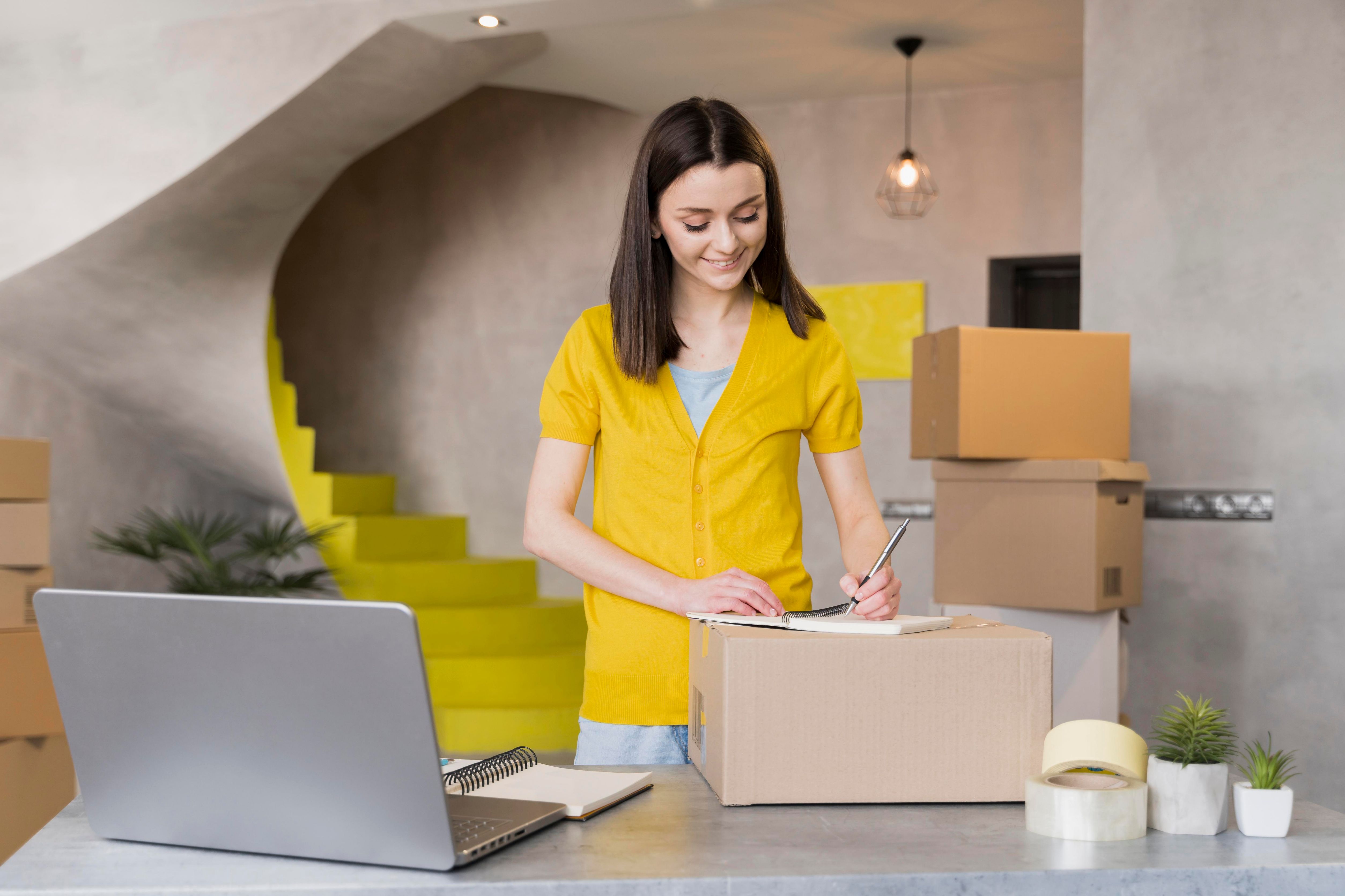 woman packing boxes-returns...