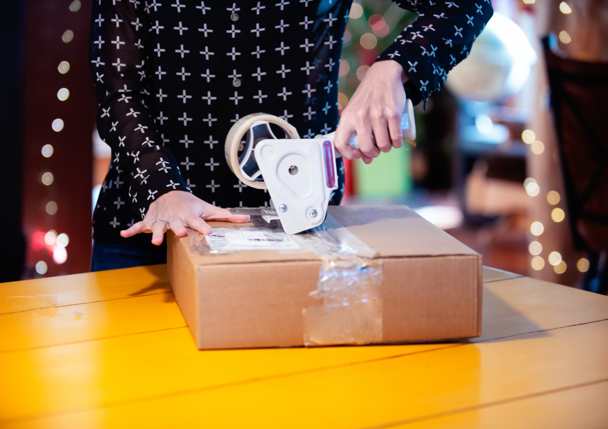 woman packing shopping retu...